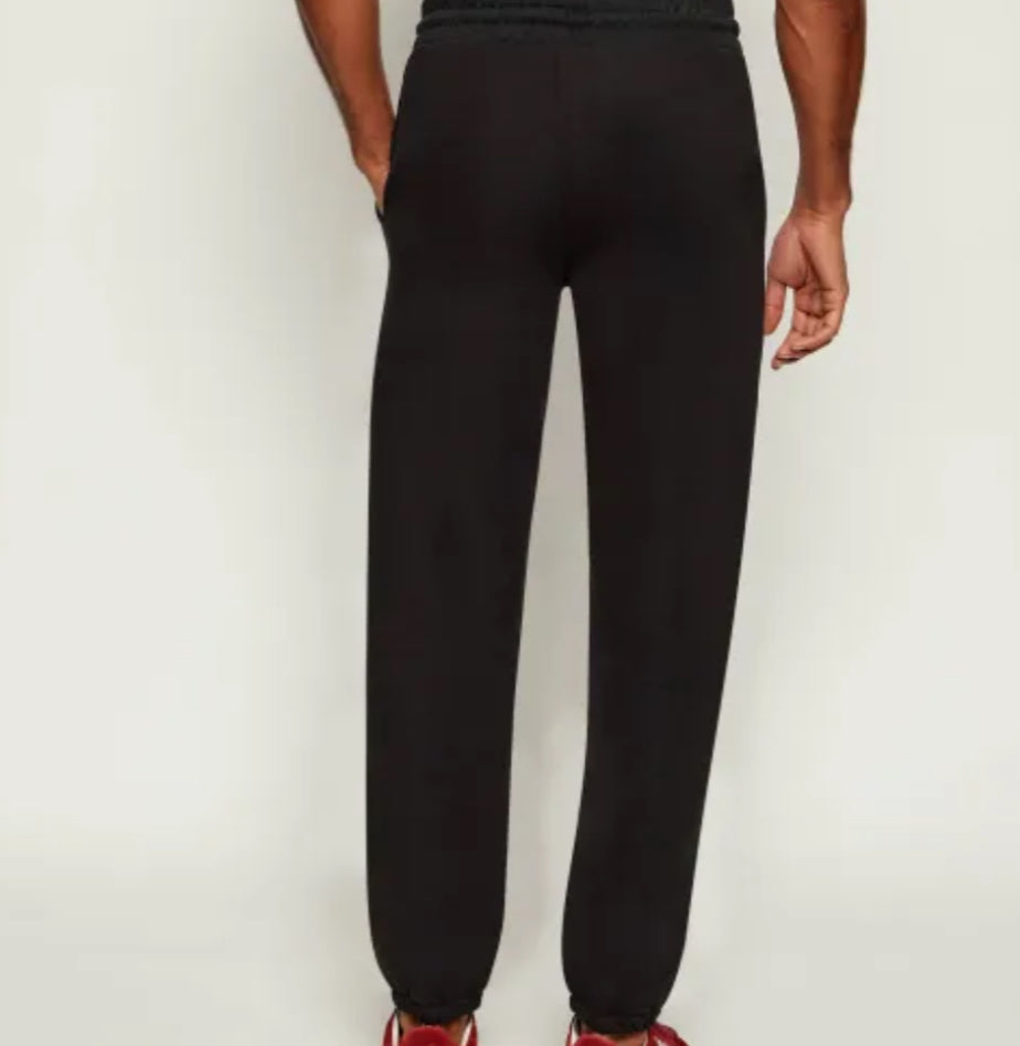 RICHMOND X JOGGINGS TROUSERS with ELASTICATED waist & logo on the front UMA25012PA